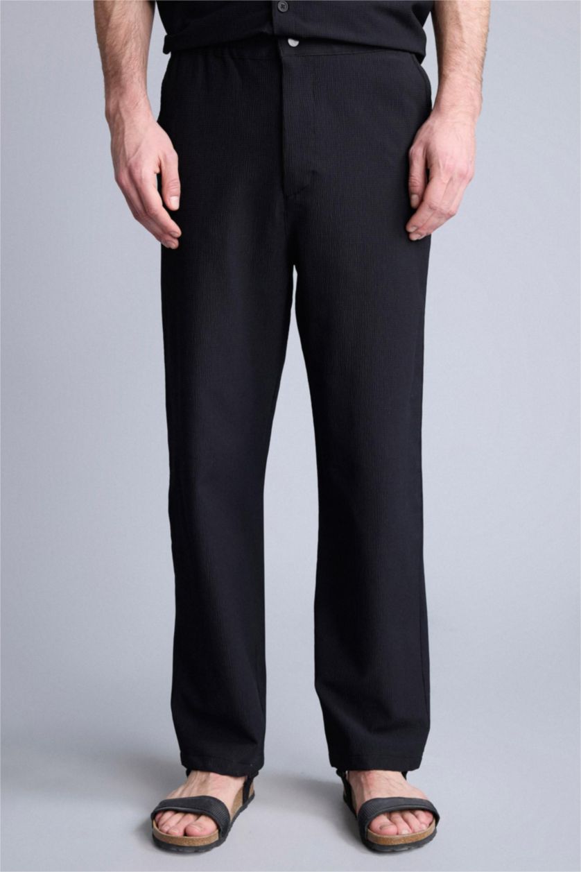 MAN Black Baggy Fit Trousers
