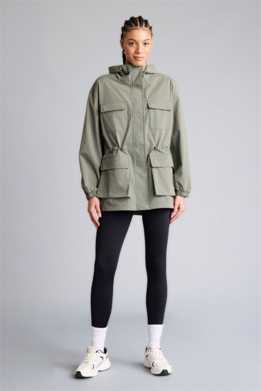 حريمي كاكي جاكيت مطر وتر بروف قصة عادية بكابيشون