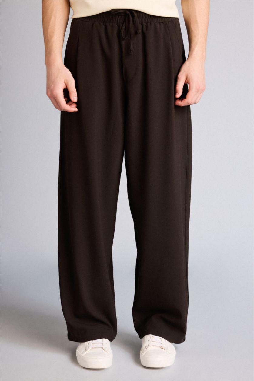 Man Brown Barrel Fit Trousers