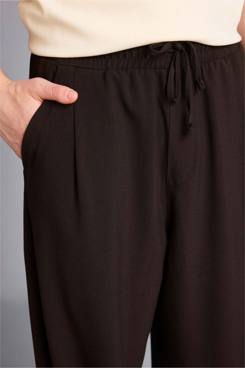 Man Brown Barrel Fit Trousers