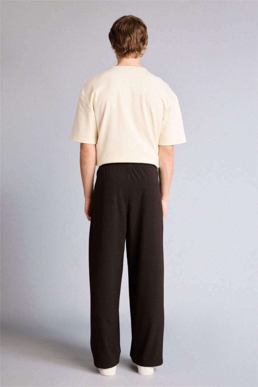 Man Brown Barrel Fit Trousers