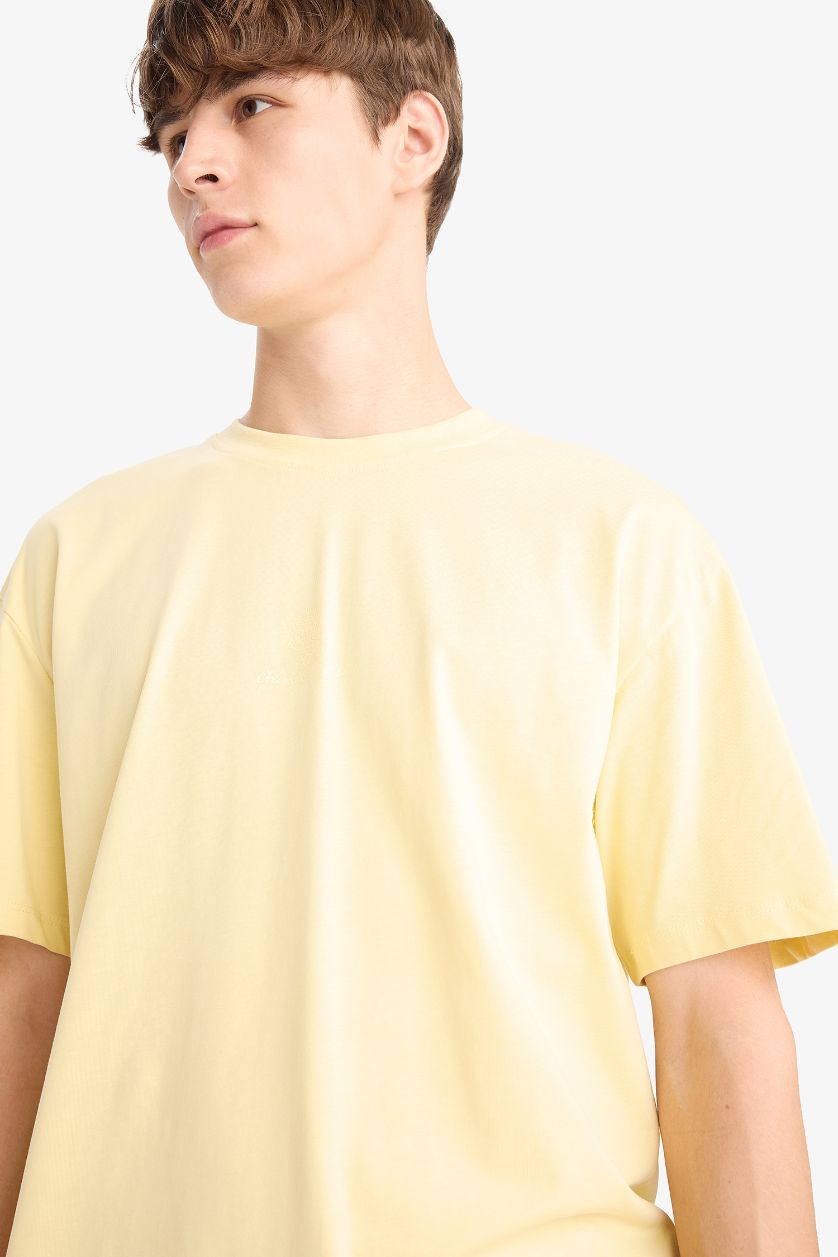 HOMME Jaune T-shirt boxy imprimé au dos en coton à col rond et manches courtes