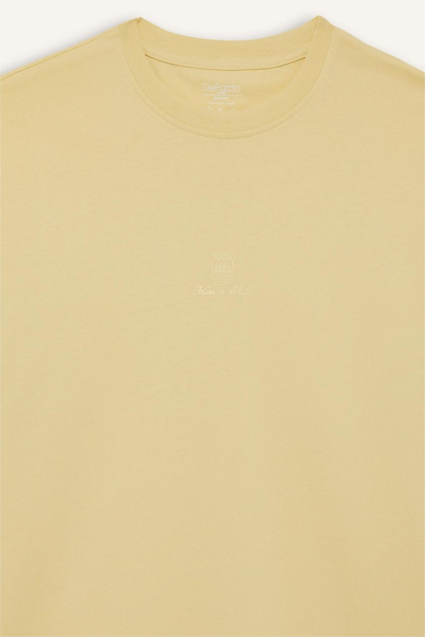 HOMME Jaune T-shirt boxy imprimé au dos en coton à col rond et manches courtes