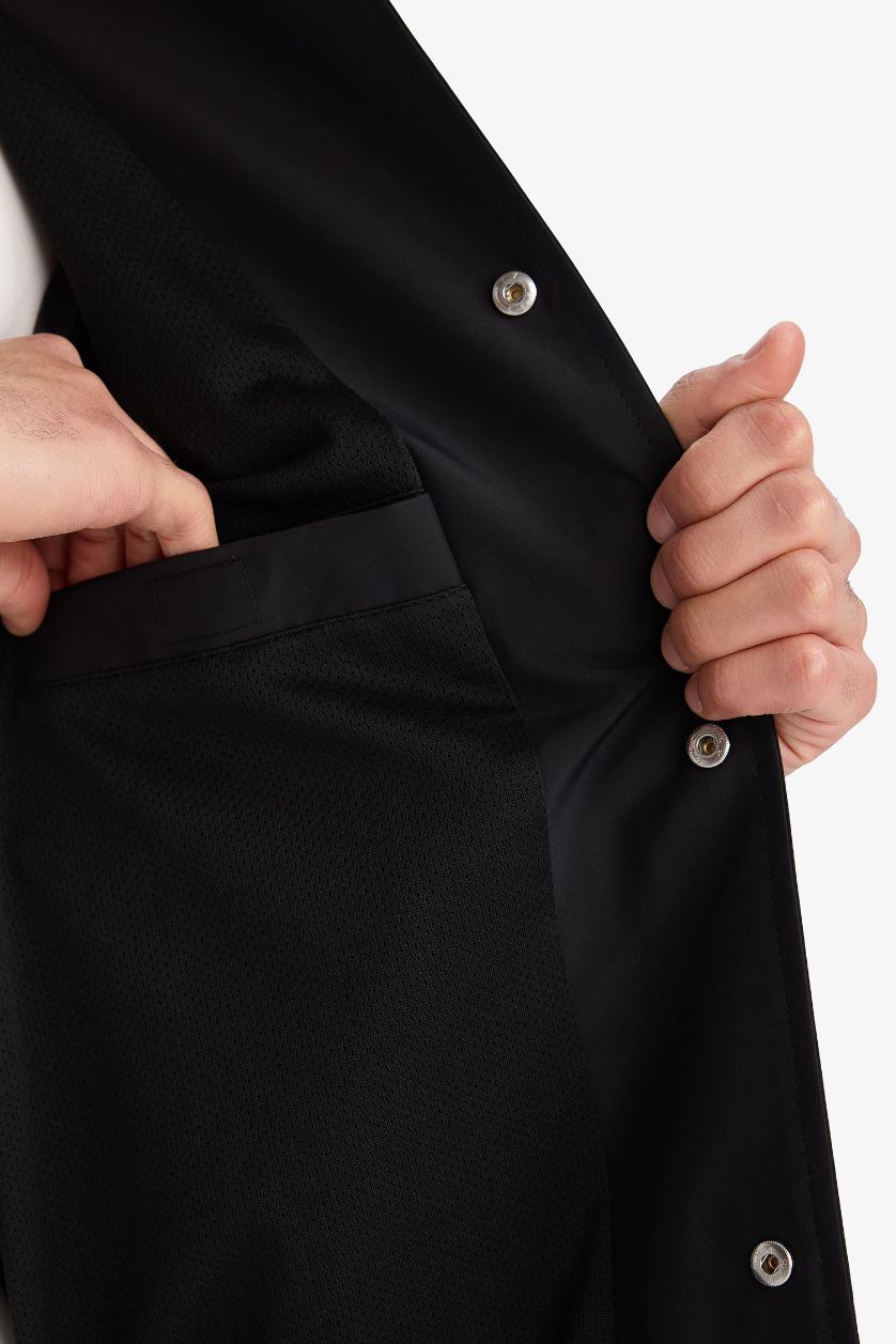 رجال أسود جاكيت اوفر سايز مقاوم للماء بياخة كوليج