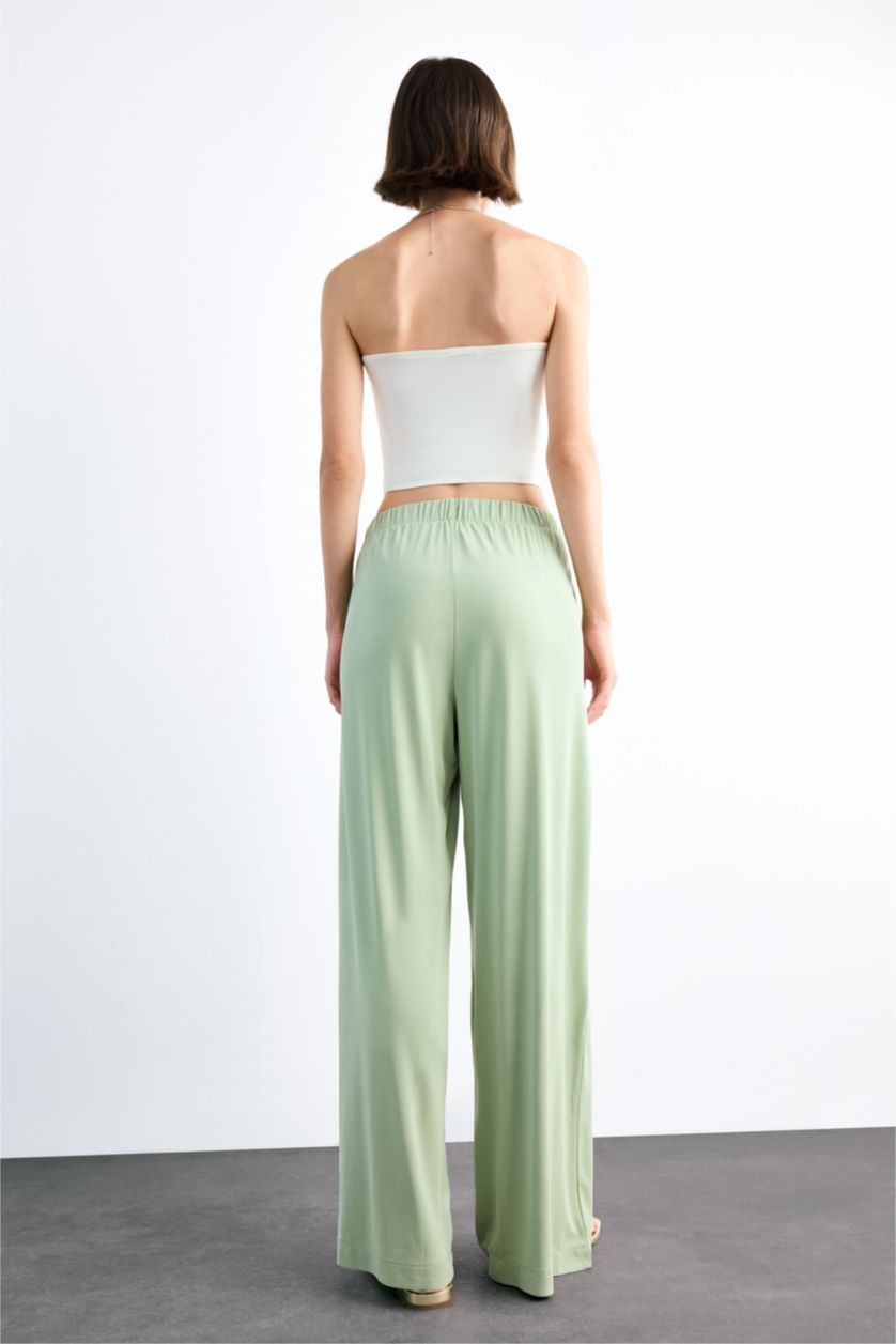 نساء أكوا بنطرون باجي فيت برجل واسع وخصر مطاطي