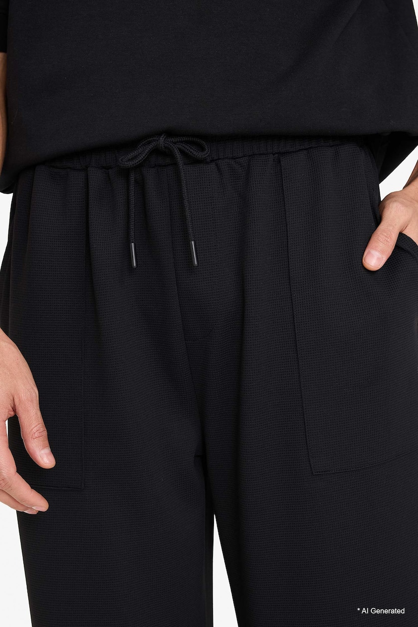 MAN Black Wide Leg Trousers