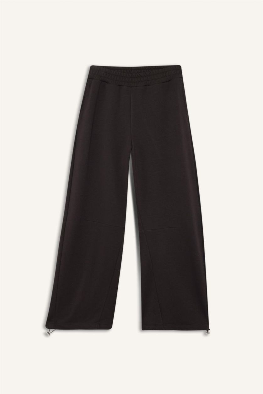 نساء بني بنطرون باريل فيت برجل عادي