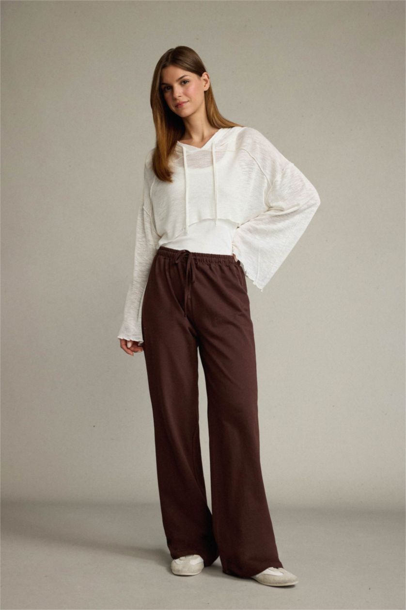 نساء بني بنطرون طويل بثلاثة جيوب