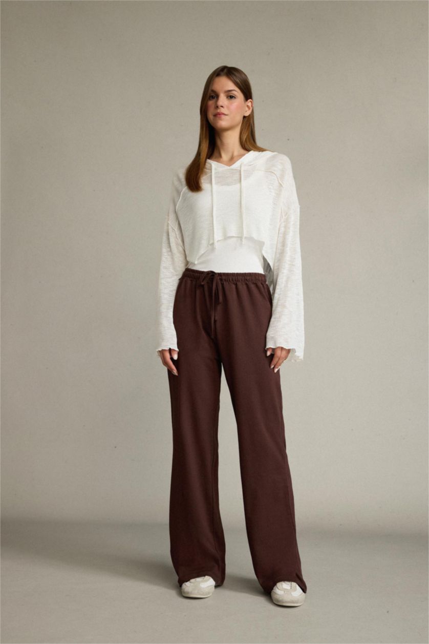 نساء بني بنطرون طويل بثلاثة جيوب