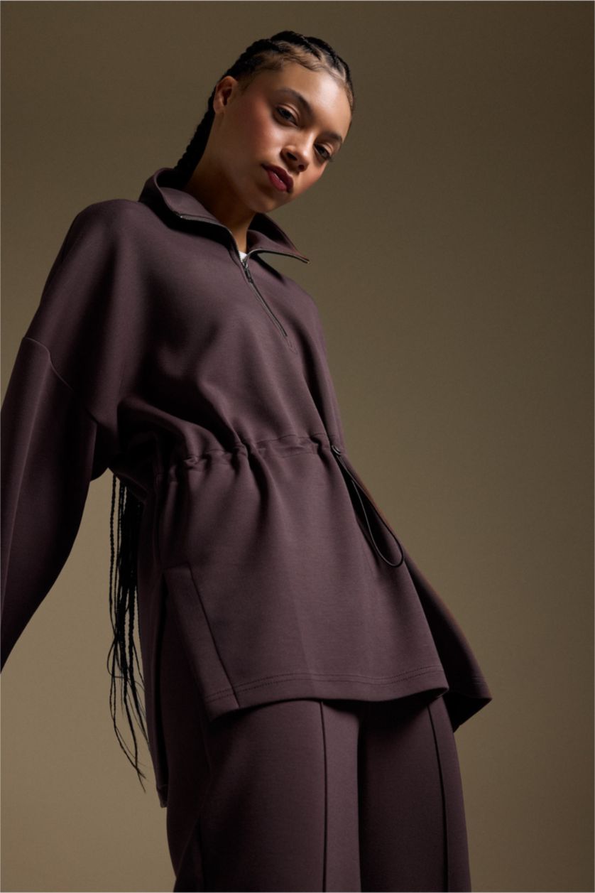 حريمي بني سويت شيرت رياضي قصة طويلة بياقة عالية نص سوسته