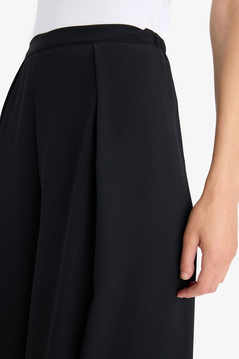 حريمي أسود بنطرون كريب فلير فيت برجل واسع وخصر عادي