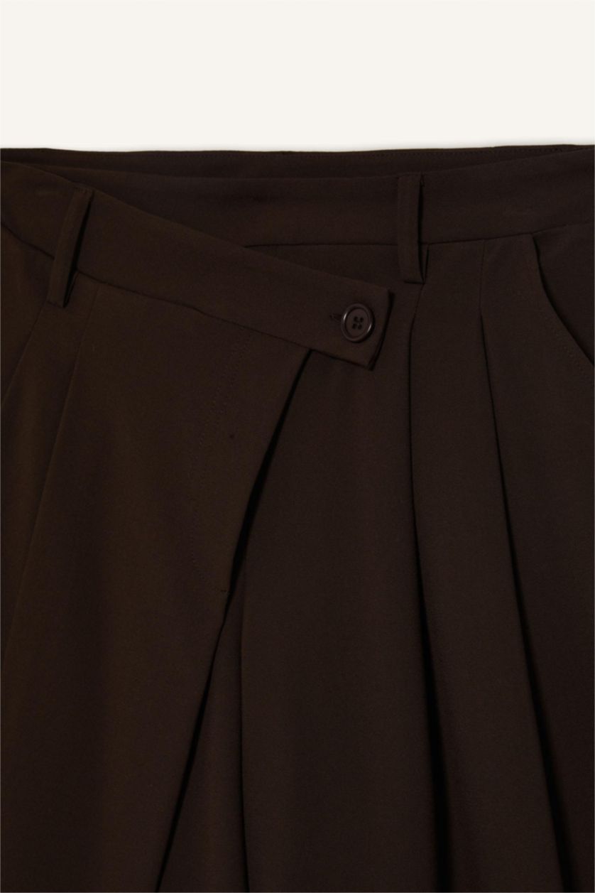 حريمي بني بنطلون باجي فيت بسحاب وخصر عادي