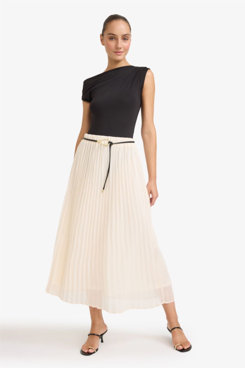 حريمي بيج فاتح جيبة ميدي شيفون قصة عادية بخصر عالي