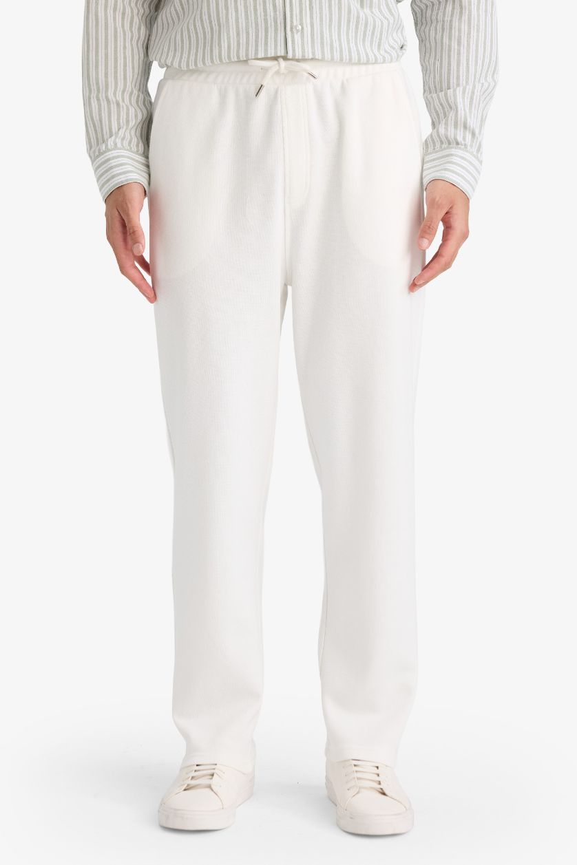 MAN White Wide Leg Trousers