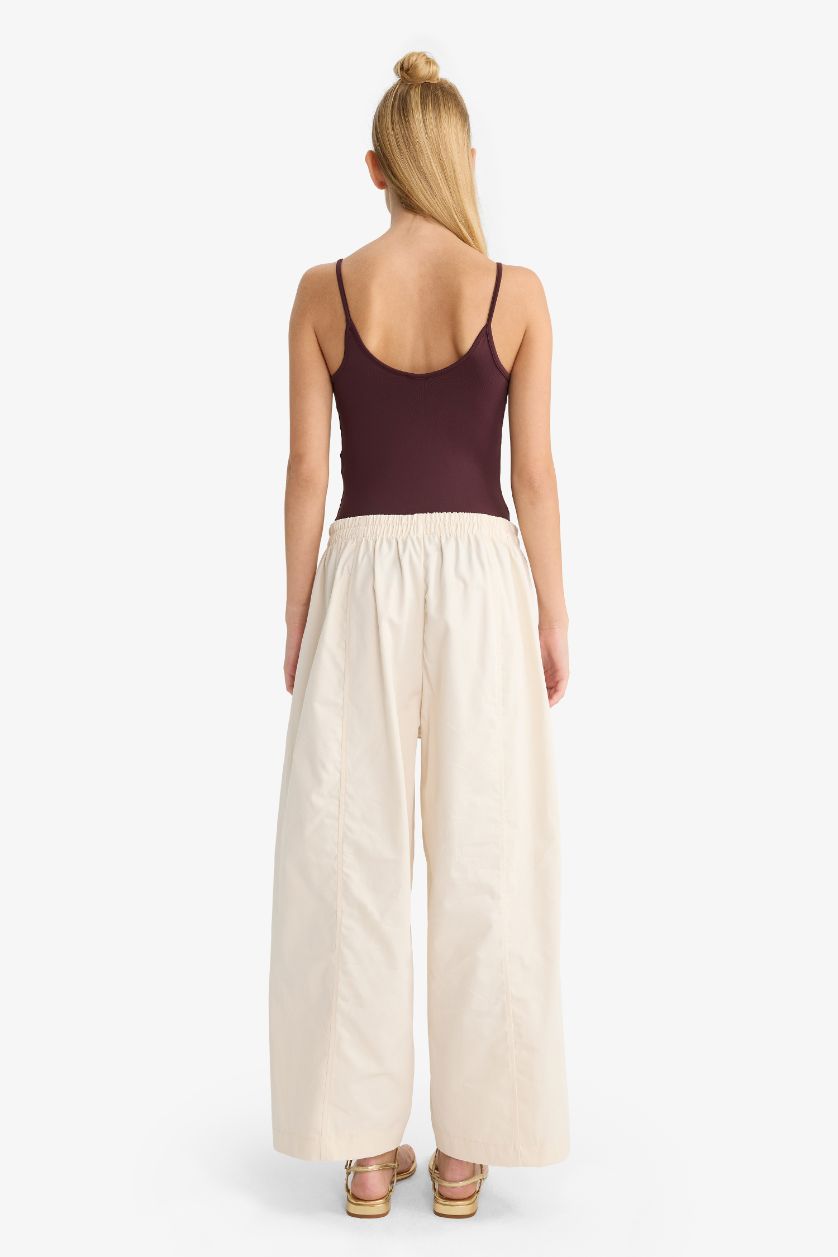 حريمي بيج بنطلون جبردين باريل فيت برجل عادية وخصر عادي