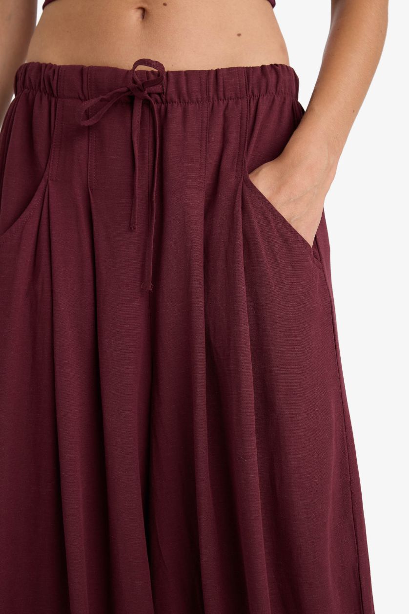 حريمي خمري بنطلون قصة بالون وسط عادي