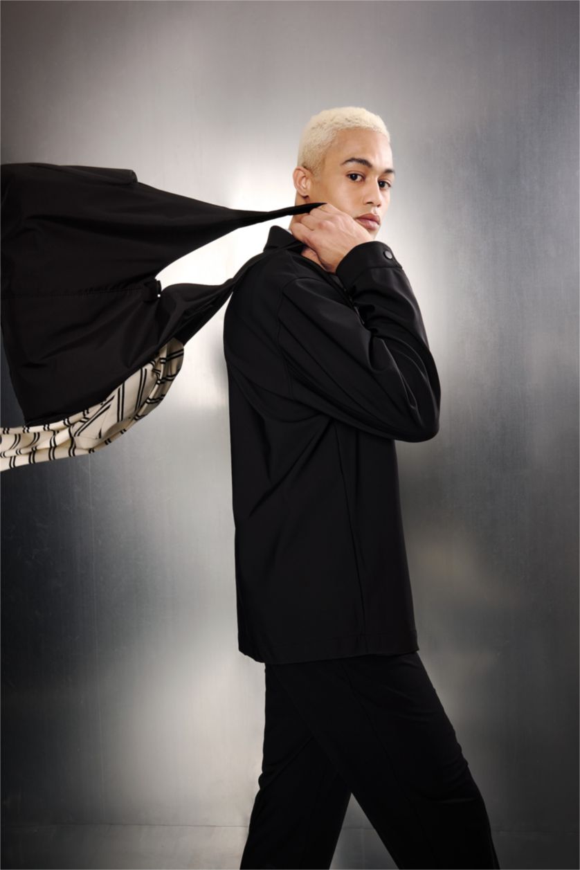 MAN Black جاكيت سليم فيت مقاوم للرياح