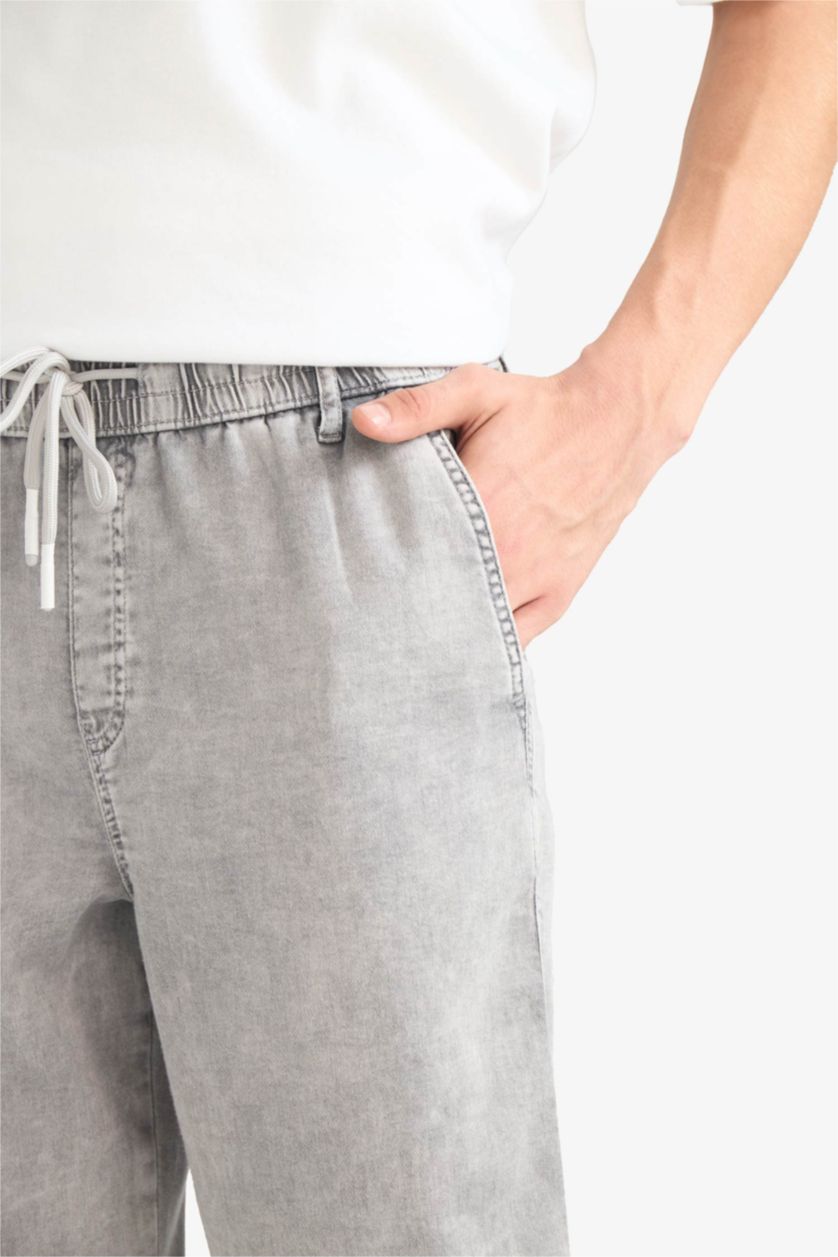 رجال رمادي فاتح بنطرون جينز برجل واسع وايد ليج