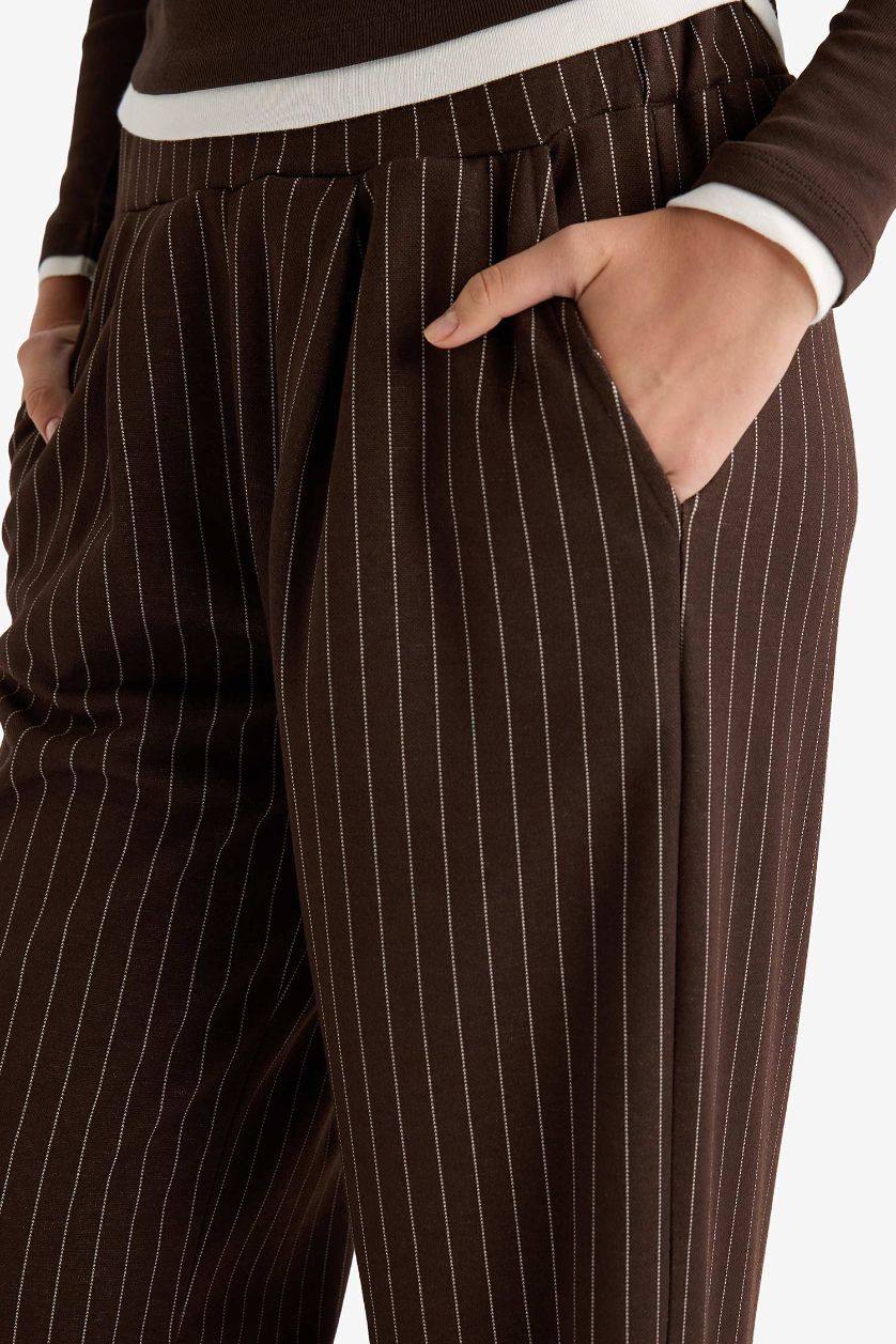 نساء بني بنطرون مخطط وايد ليج برجل واسع