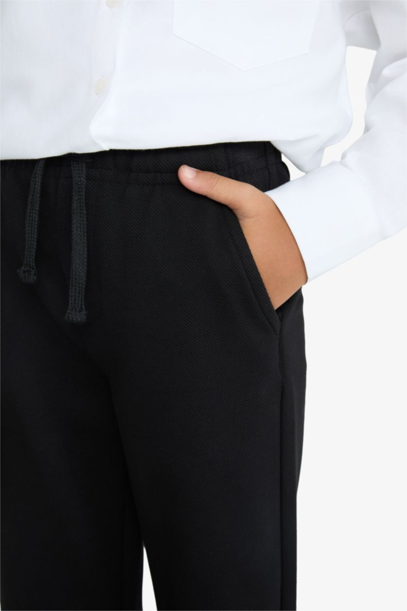 أولادي أسود بنطلون اولادي قصة عادية وخصر مطاطي