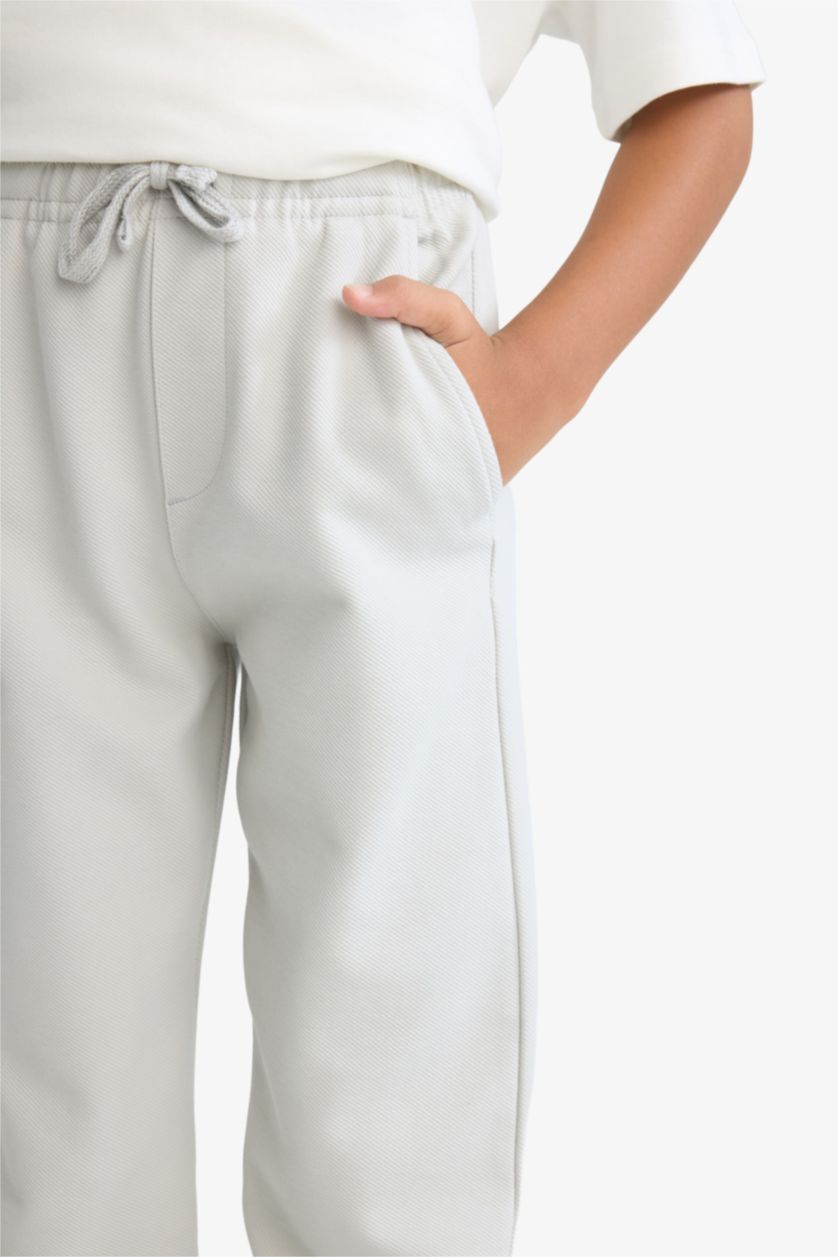 أولادي اللون الحجري بنطلون اولادي قصة عادية وخصر مطاطي