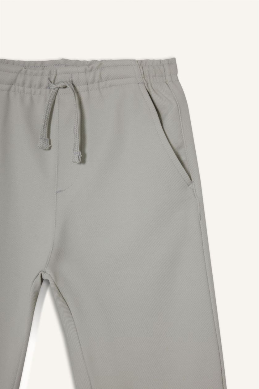 أولادي اللون الحجري بنطلون اولادي قصة عادية وخصر مطاطي