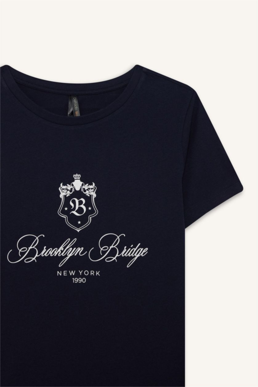 نساء كحلي تيشيرت نص ردن قصة عادية وياخة مستديرة وطبعة شعار