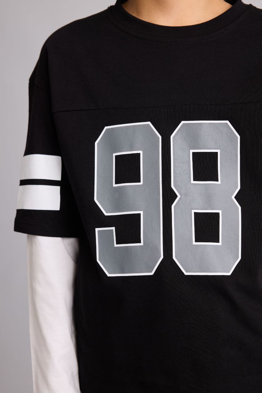 أولاد أسود تيشيرت ولادي قصة عادية وطبعة شعار