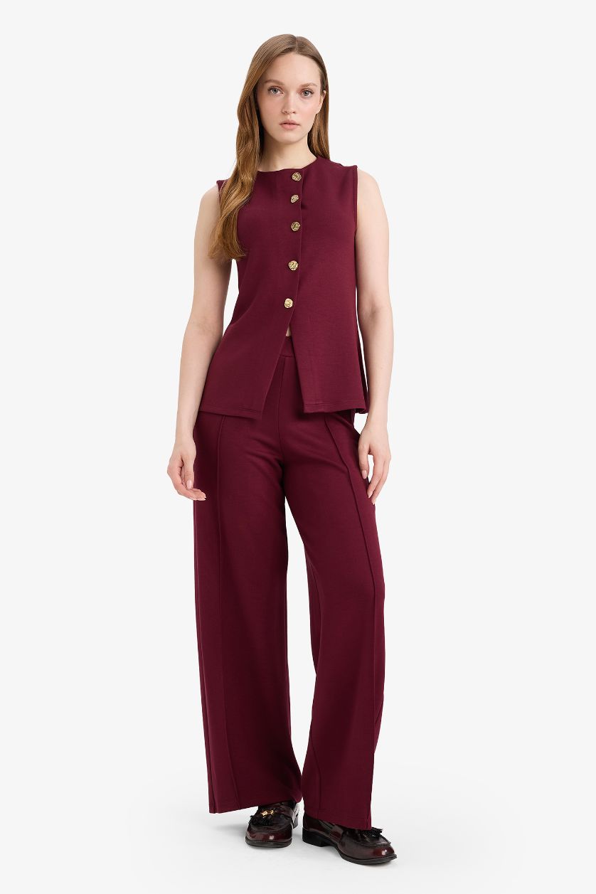 حريمي خمري كارديجان تريكو بقصة سليم وياقة دائرية