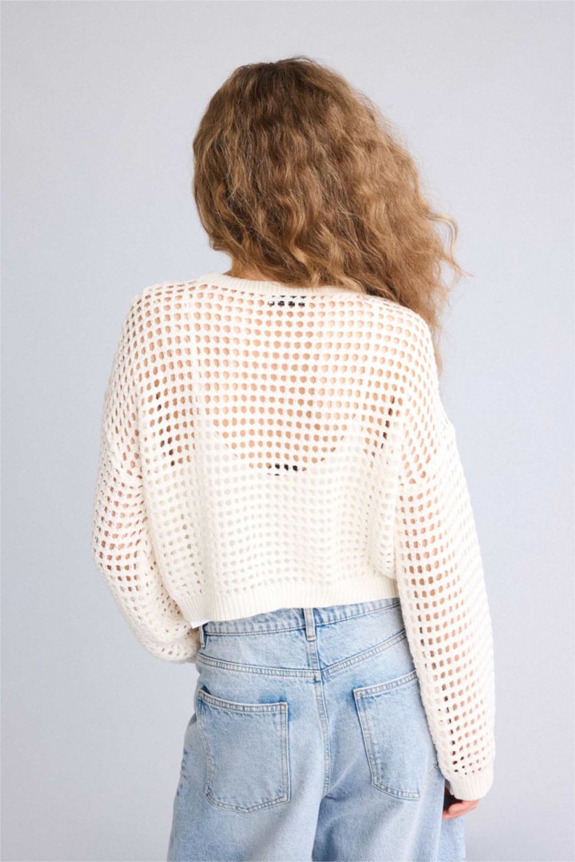 حريمي بيج فاتح بلوفر تريكو كروب فيت بياقة مستديرة