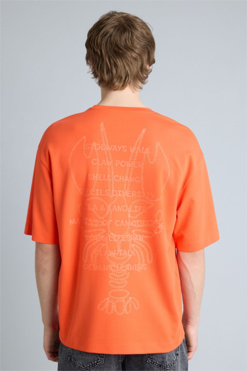 Ерлер қызғылт сары Тыныс алатын Boxy Fit баспалы футболка