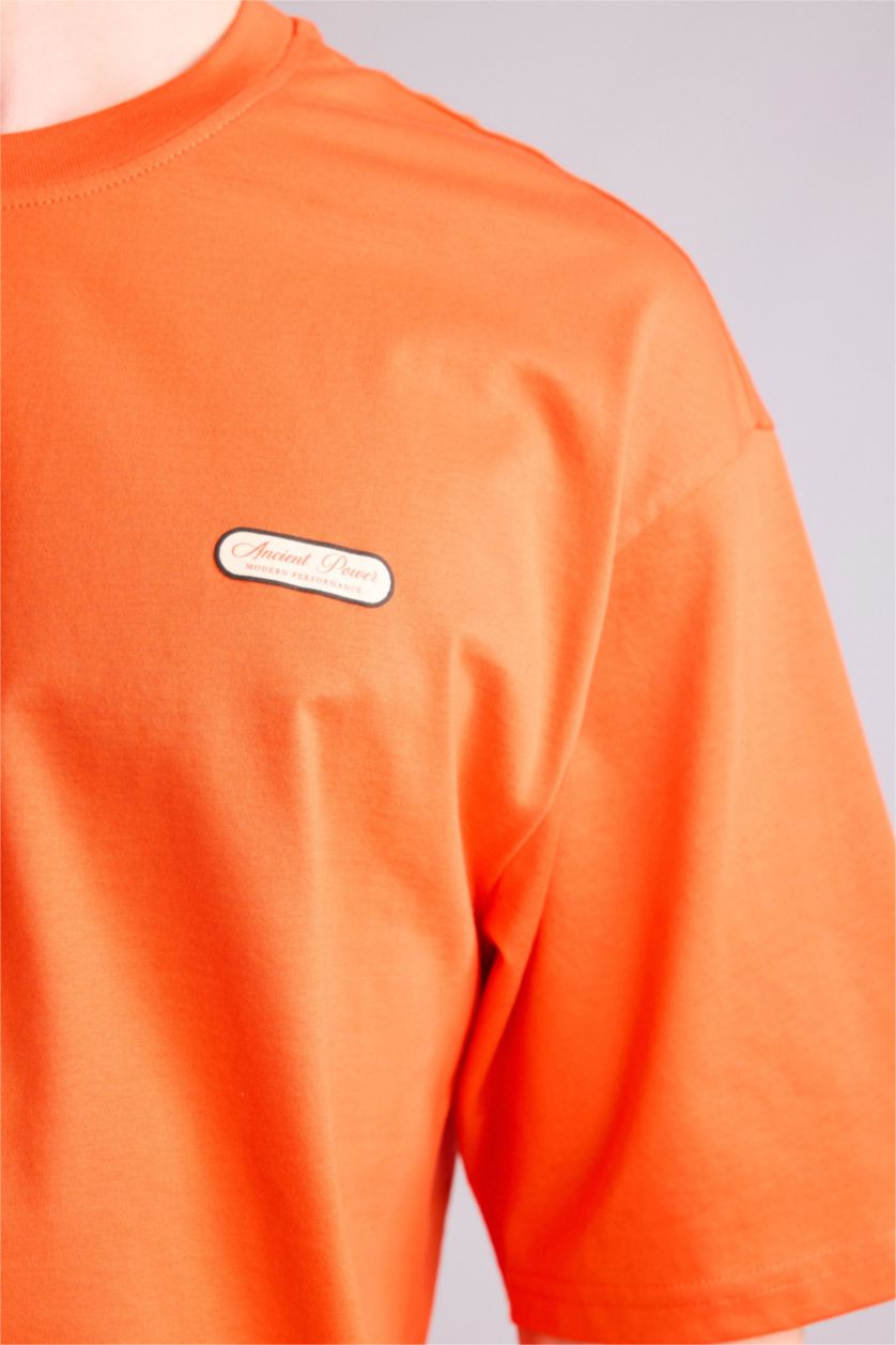 Ерлер қызғылт сары 100% мақта Boxy Fit баспалы футболка