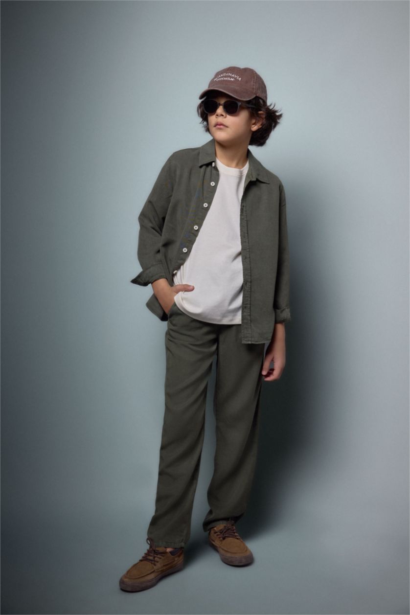 أولاد كاكي داكن بنطرون ولادي قماش ايوسل قصة عادية ورجل عادي