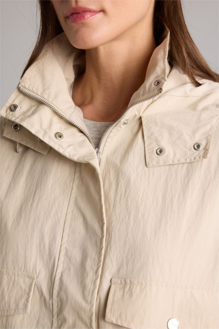 نساء اللون الحجري جاكيت خفيف مقاوم للماء قصة عادية بغطاء للرأس