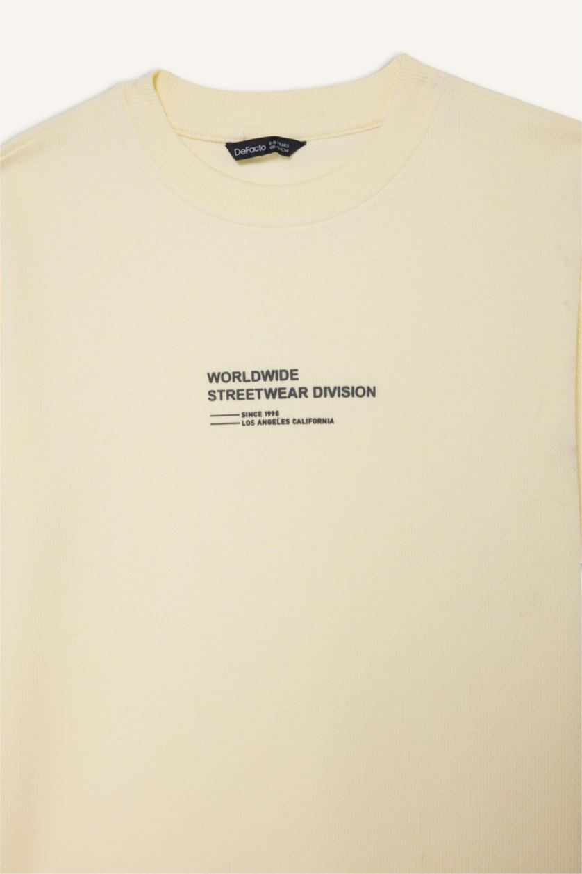 أولادي أصفر فاتح تيشيرت اولادي نص كم بطبعة شعار اوفر سايز