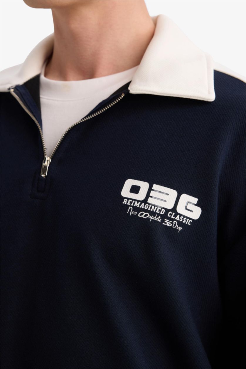 رجالي كحلي سويت شيرت اوفر سايز بطبعة شعار بياقة بولو نص سحاب