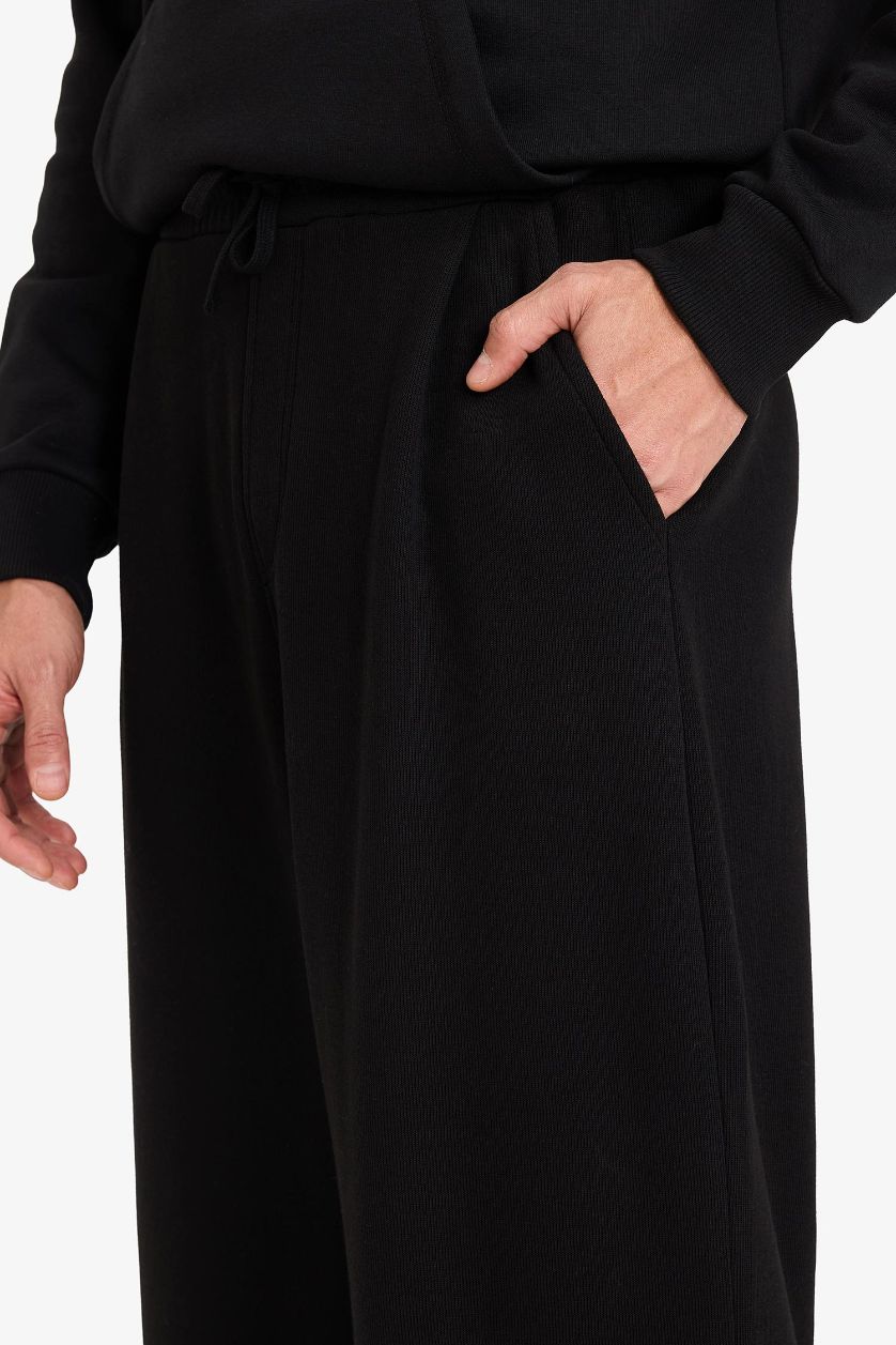 MAN Black Barrel Fit Sports Pants