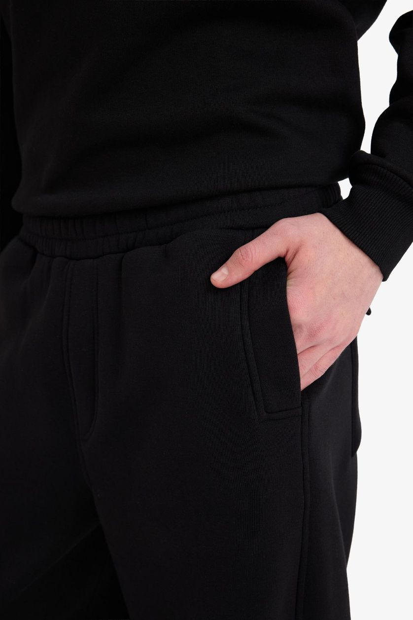 MAN Black Balloon Fit Straight Leg Trousers