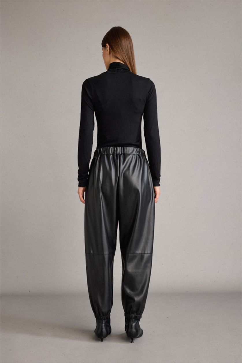 نساء أسود بنطلون جلد صناعي بالون فيت بخصر مطاطي