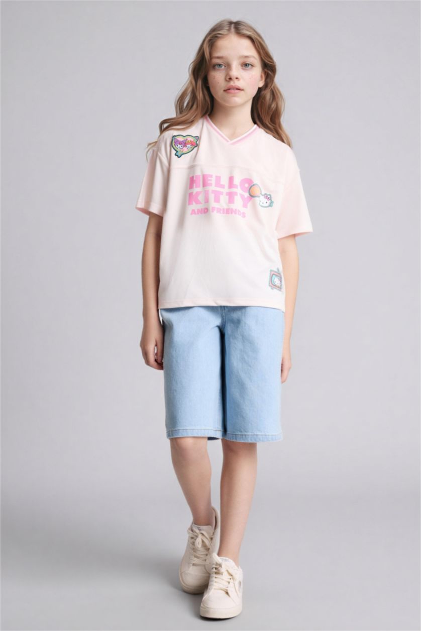 بنات زهري فاتح تيشيرت نص ردن اوفر سايز بياخة V من هيلو كيتي