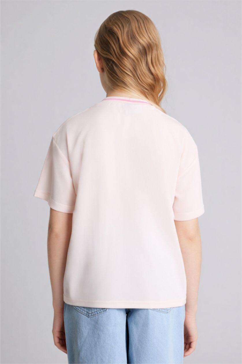 بنات زهري فاتح تيشيرت نص ردن اوفر سايز بياخة V من هيلو كيتي