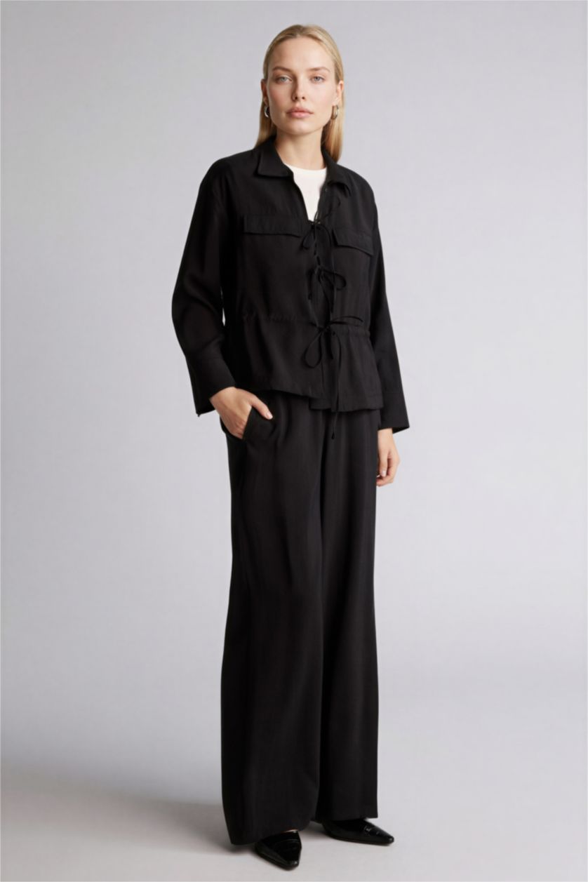 حريمي أسود قميص كم طويل قصة عادية