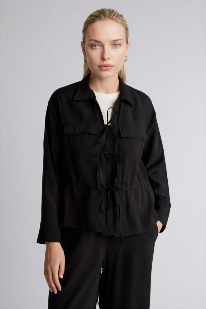 حريمي أسود قميص كم طويل قصة عادية