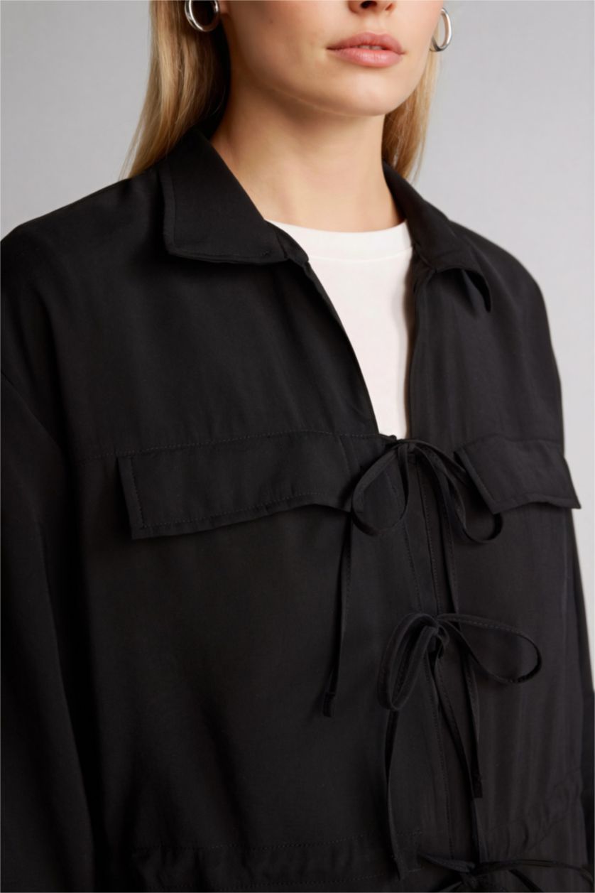 حريمي أسود قميص كم طويل قصة عادية