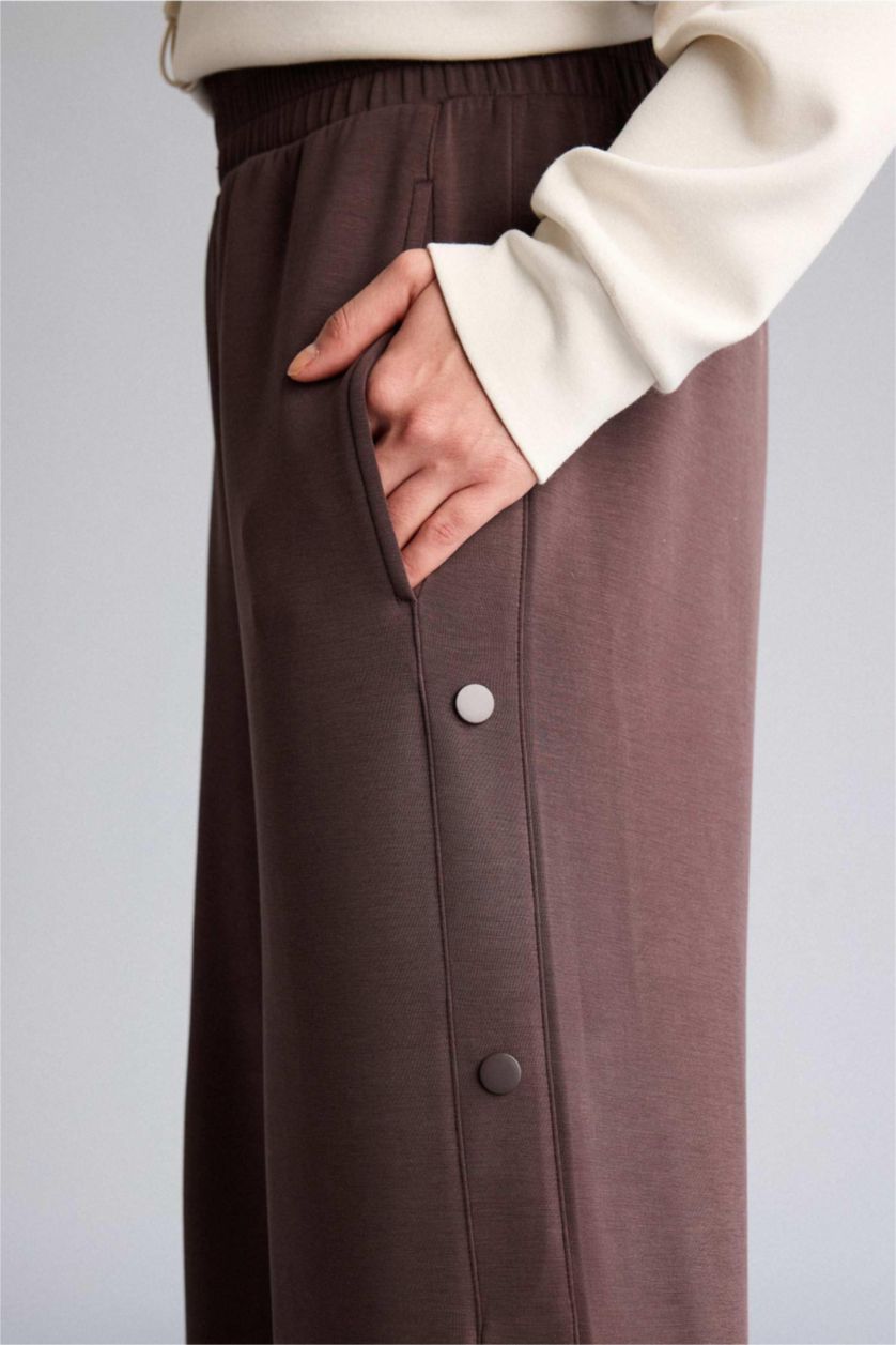 حريمي بني بنطلون نسيج مشروط وايد ليج برجل واسع بجيب