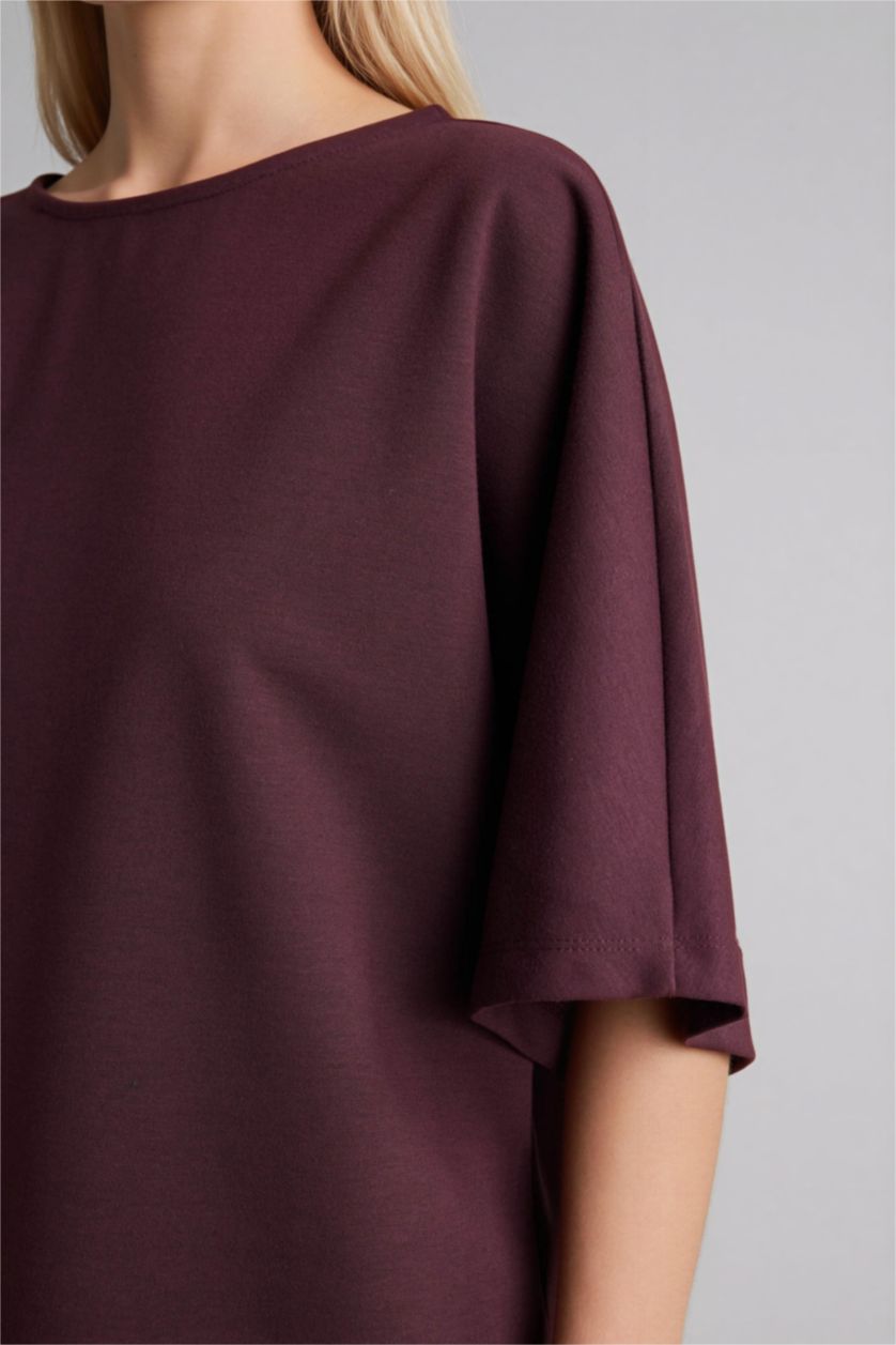 نساء بني تيشيرت ردن طويل وياخة عريضة