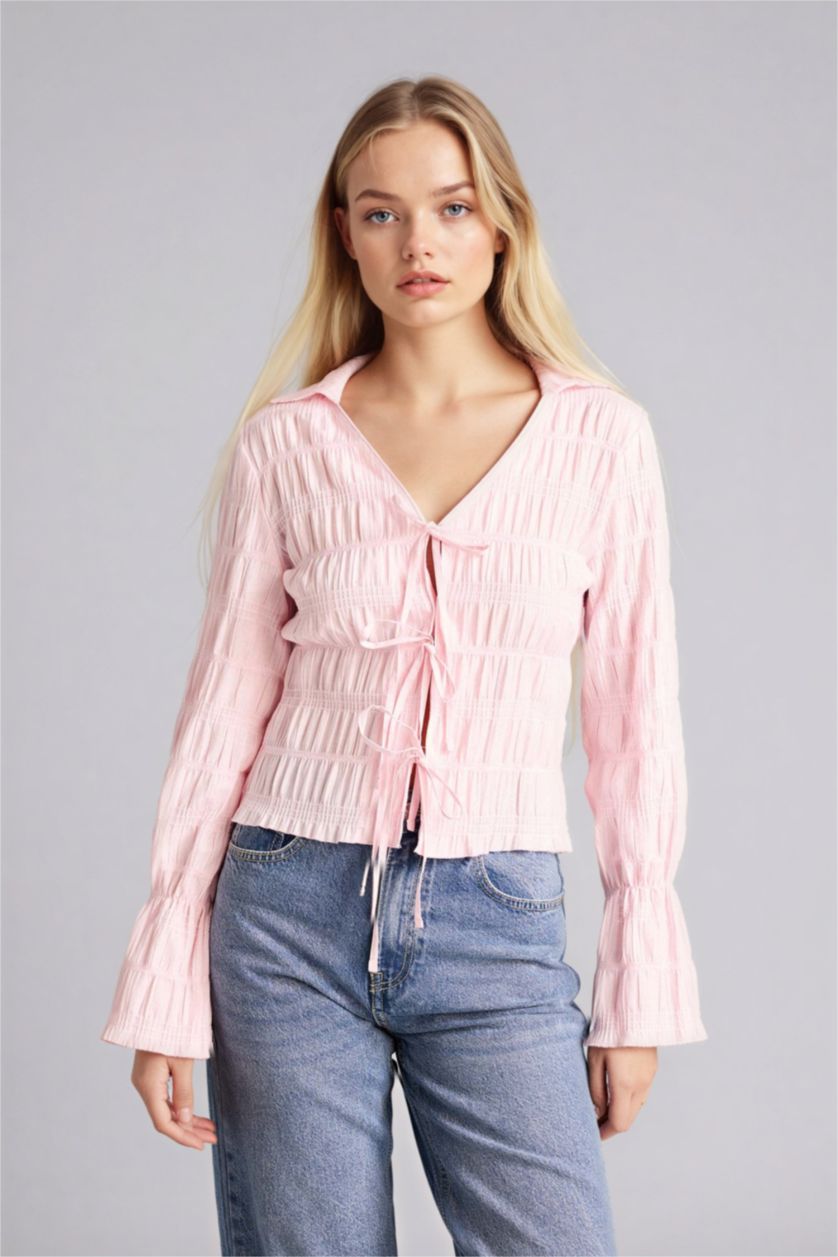 حريمي زهري فاتح بلوزة كم طويل قصة عادية بياقة قميص