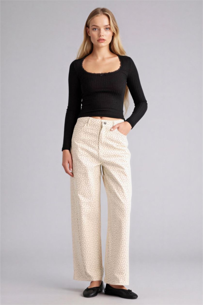 حريمي أبيض بنطلون منقط جبردين باجي فيت وخصر عادي