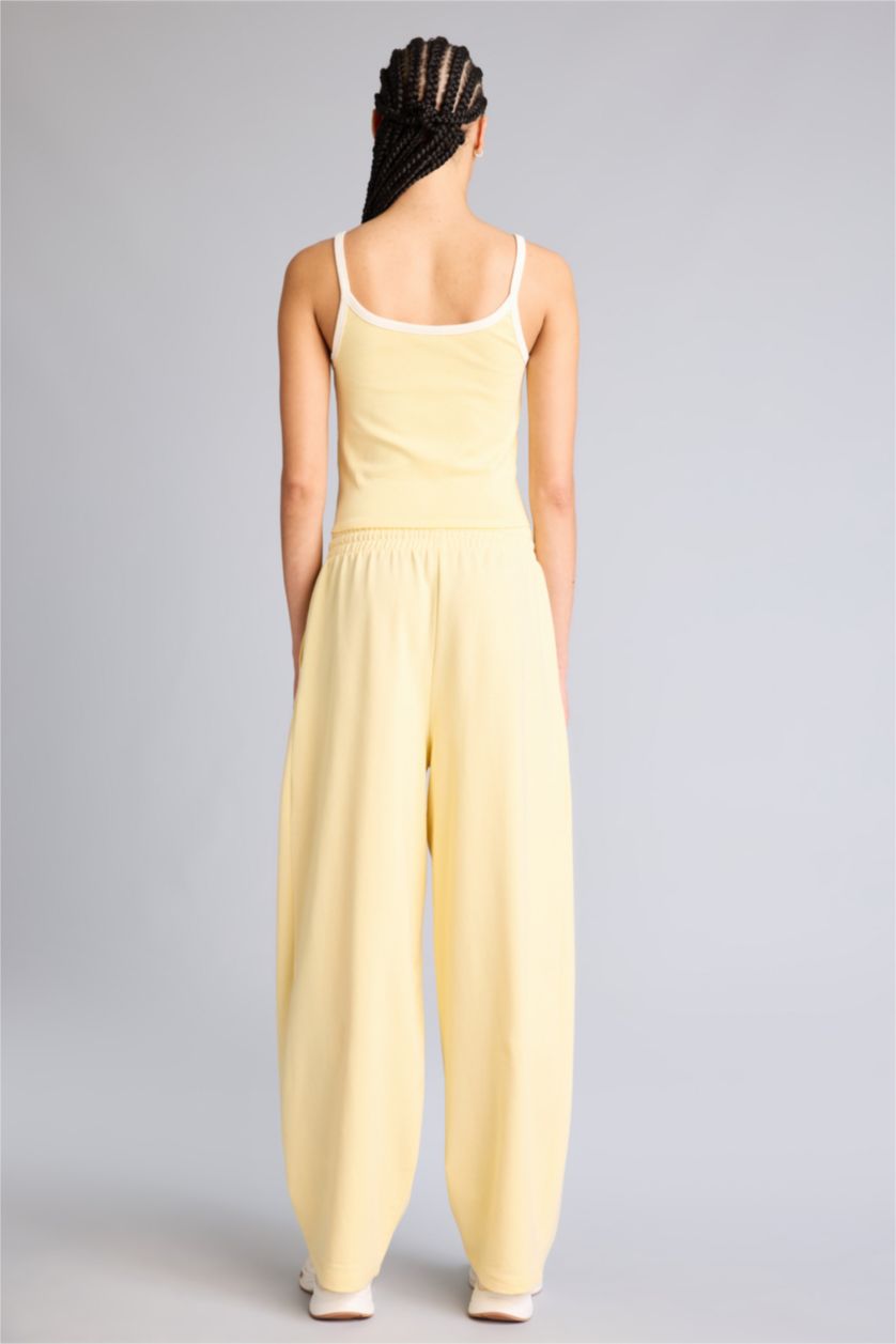 Женщины Светло-желтый Спортивные брюки Airtech NBA Boston Celtics Barrel Fit с карманами и стандартными штанинами