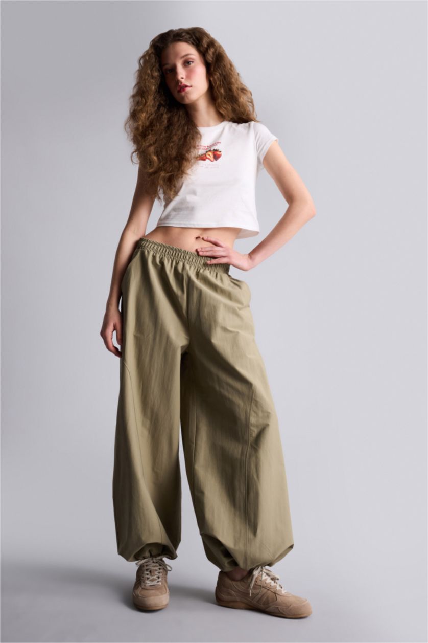 حريمي اوف وايت تيشيرت نص كم مخصر سليم فيت مطبوع